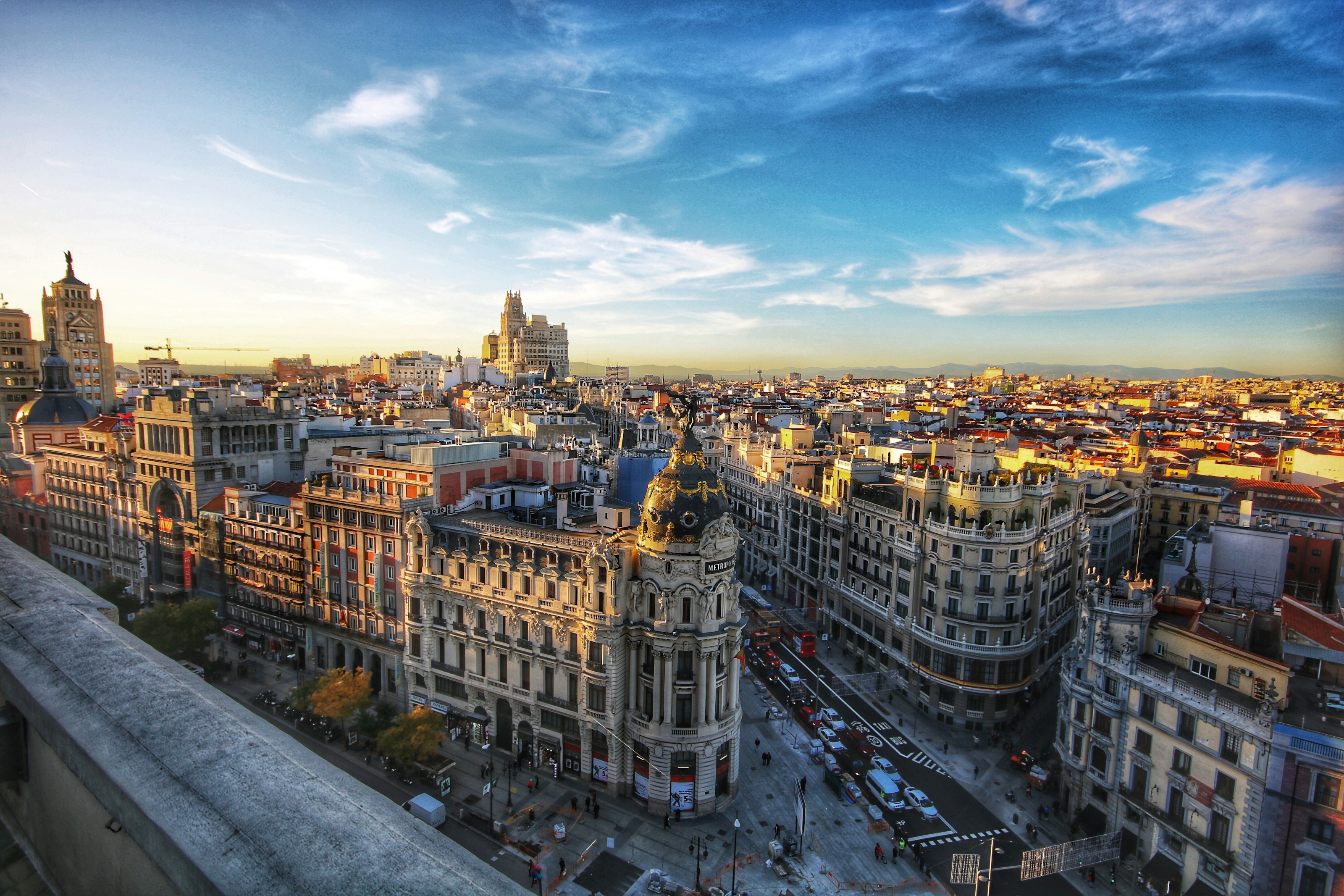 The rooftops and domes of Madrid's Gran Via at golden hour